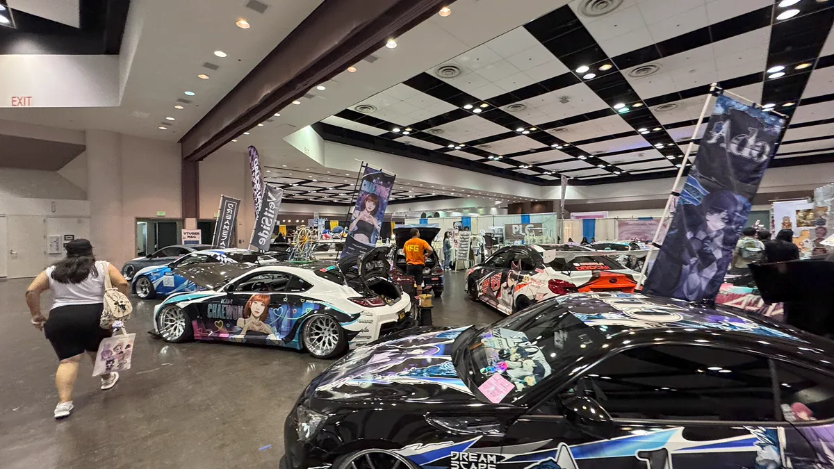 Front view of customized vehicle featuring full anime car wrap graphics
