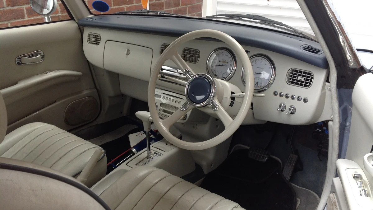 Cute Car Charms Interior Cabin Accents Cute car charms and interior styling accents on retro vehicle dashboard
