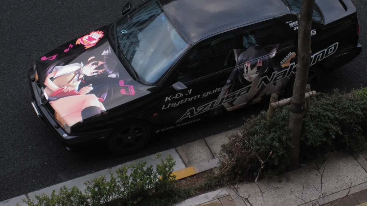 Detailed side door panel graphics on an anime car wrap project