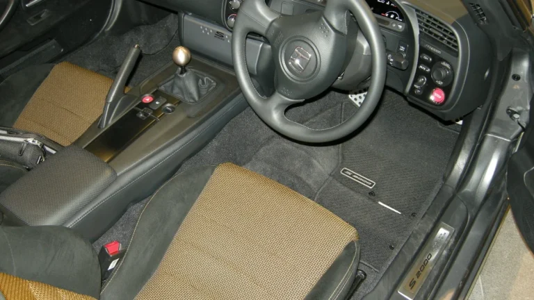 JDM car accessories and weighted shift knob in driver cockpit