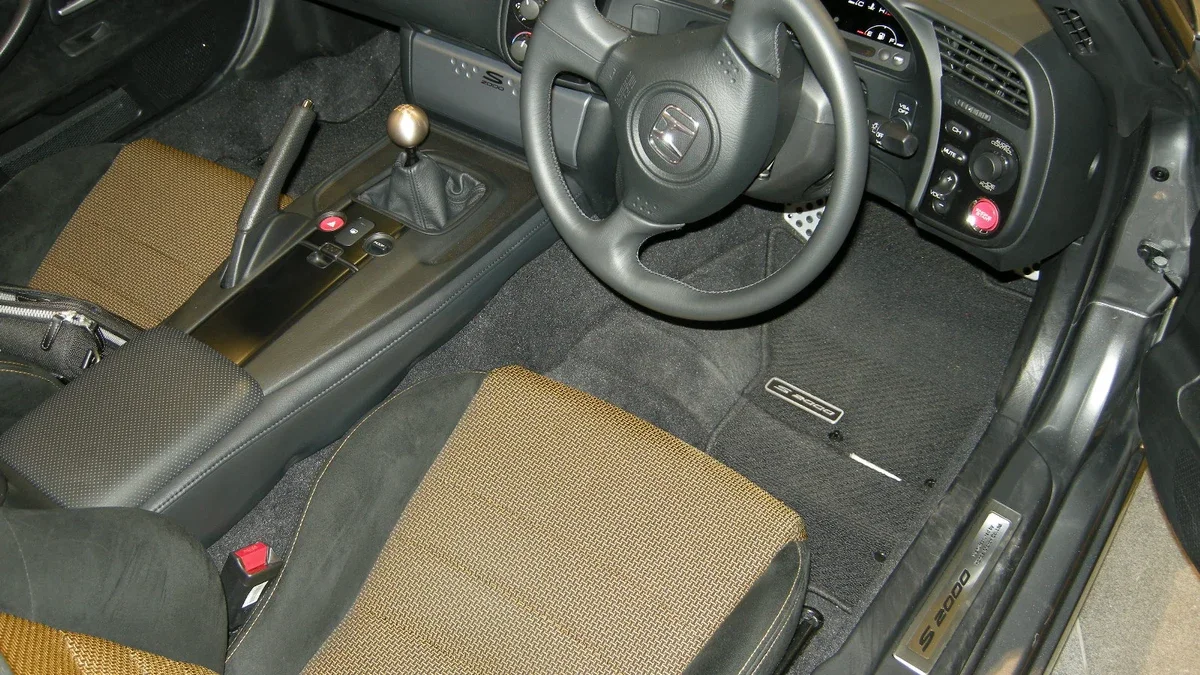 JDM Car Accessories Cockpit Styling Setup JDM car accessories and weighted shift knob in driver cockpit